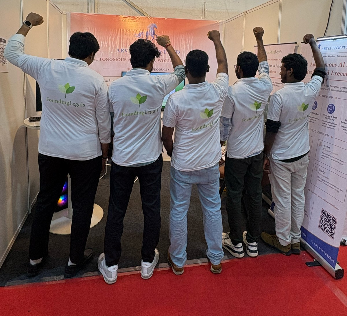 Founding Legals team at exhibition booth